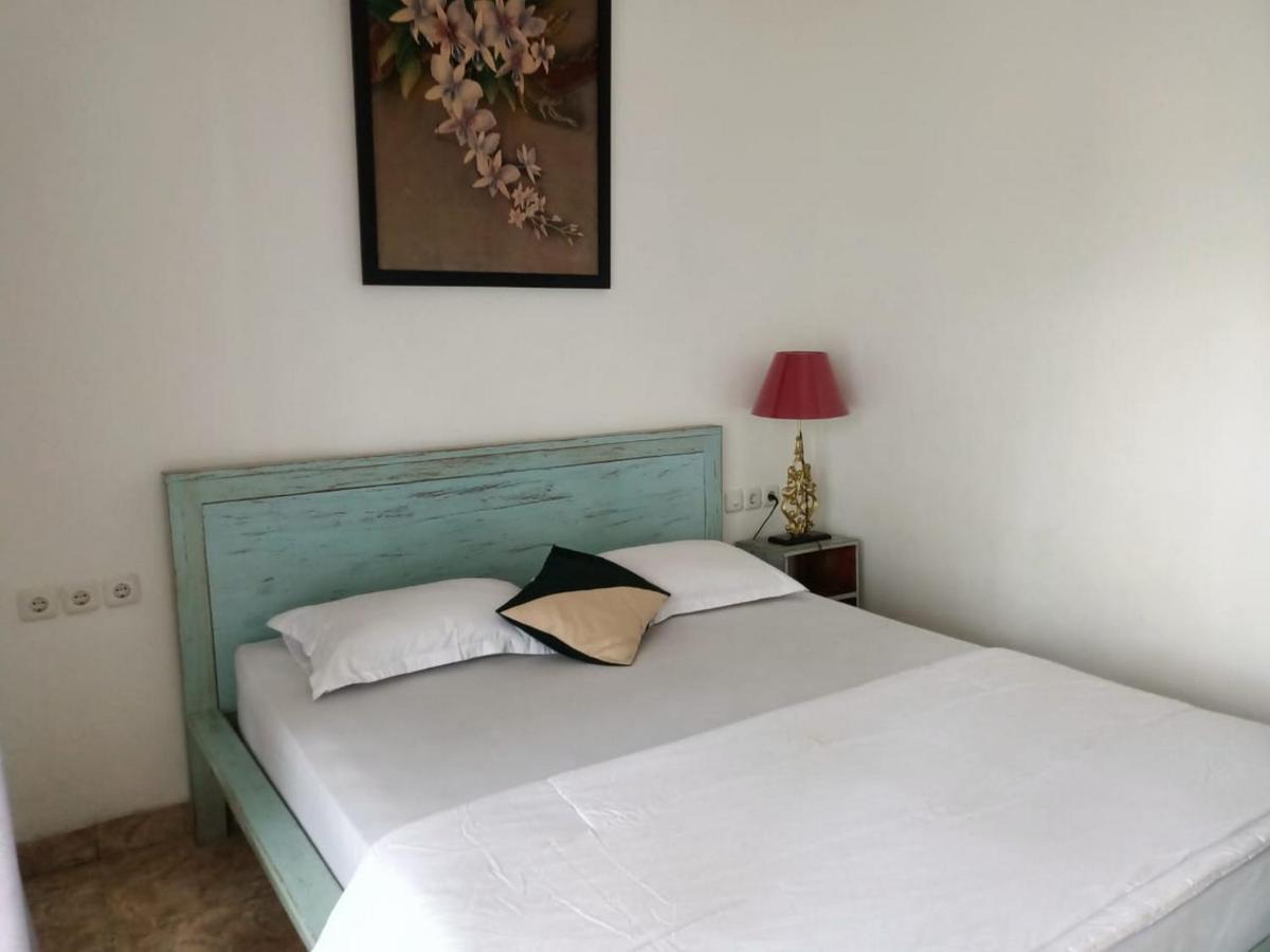 B&B Jogjakarta - RedDoorz at Griya Cemara Homestay Yogyakarta - Bed and Breakfast Jogjakarta