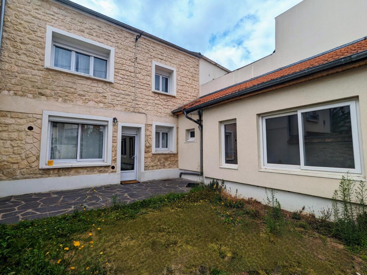 Spacieuse maison avec jardin, proche de Paris - Ferienwohnung Houilles