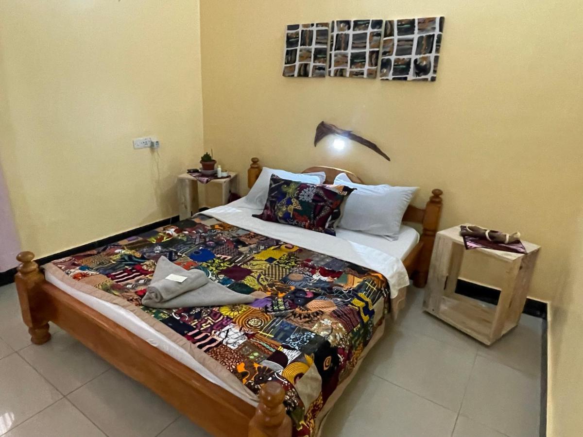 Habitación Triple con vistas al jardín