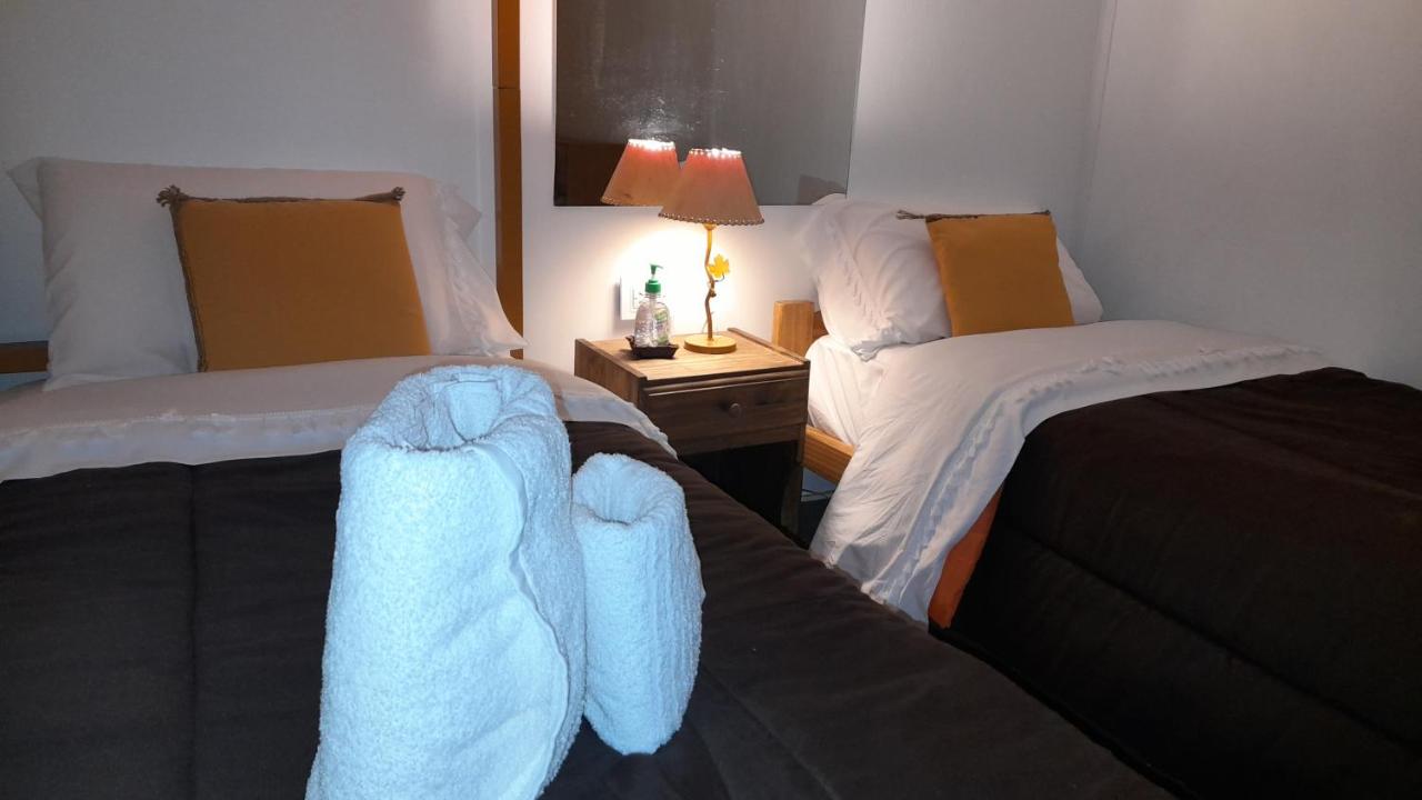 Habitación Triple con baño privado externo

