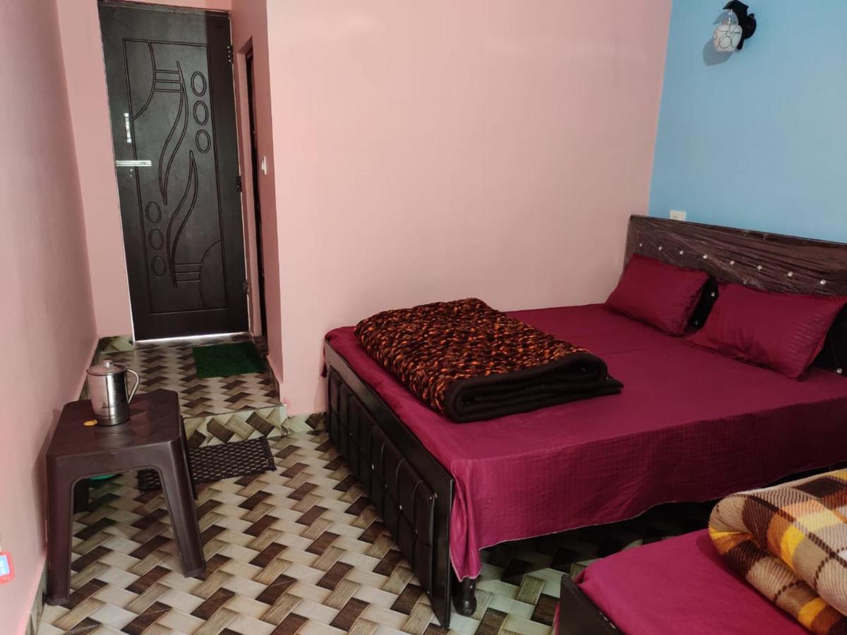 Chambre Double Deluxe (1 Adulte + 1 Enfant)