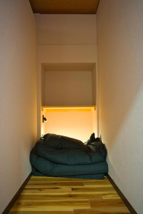 Single Bed in Dormitory Room