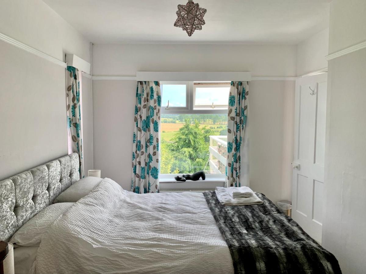 Kamer met Kingsize Bed en Uitzicht op de Tuin