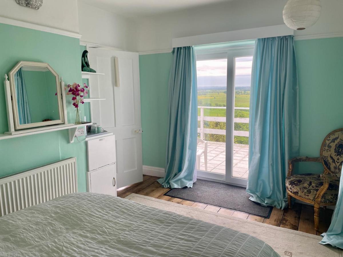 Kamer met Kingsize Bed en Uitzicht op de Tuin