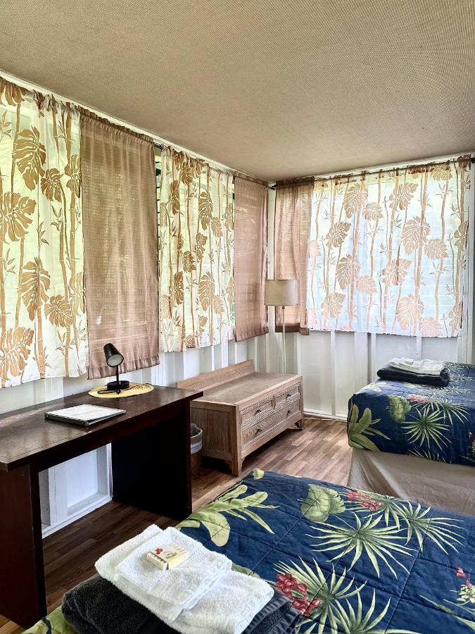 Camera Doppia con Letti Singoli e Bagno in Comune