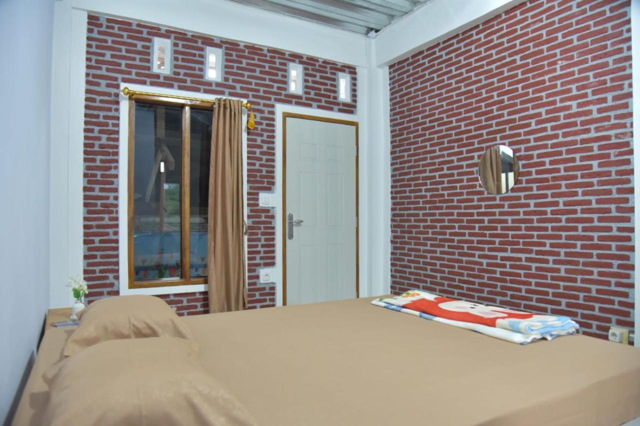 Chambre Deluxe (2 Adultes + 1 Enfant)