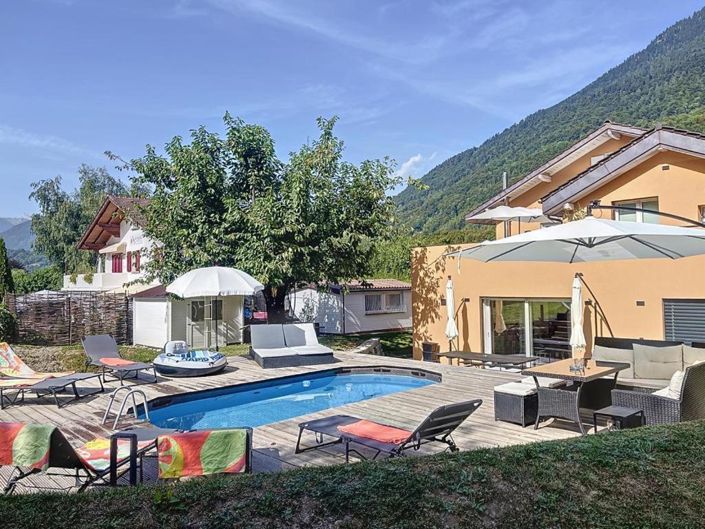 Appartement moderne avec terrasse et piscine à Châtel sur Bex - Ferienwohnung