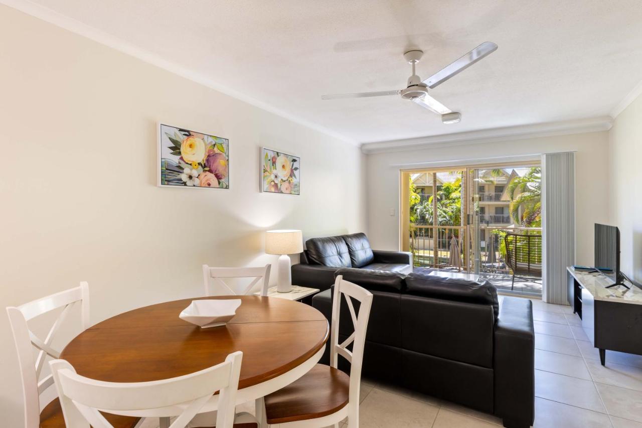 Black leather sofa sits at dog-friendly Port Douglas Sands Resort in Port Douglas.