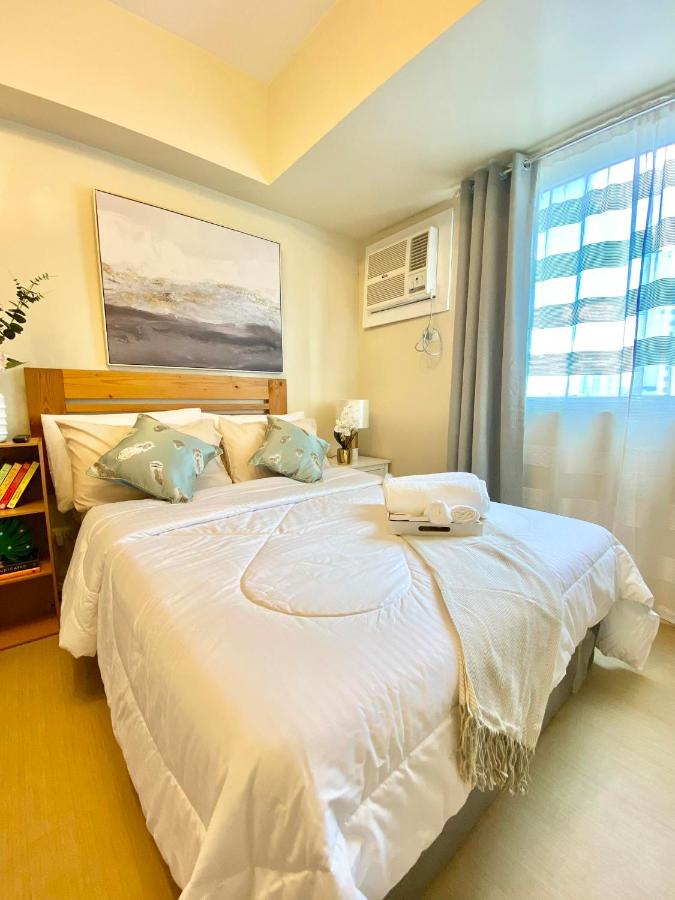 B&B Davao - Cozy Studio in Metro Davao with W&D, Pool, & Gym - Bed and Breakfast Davao