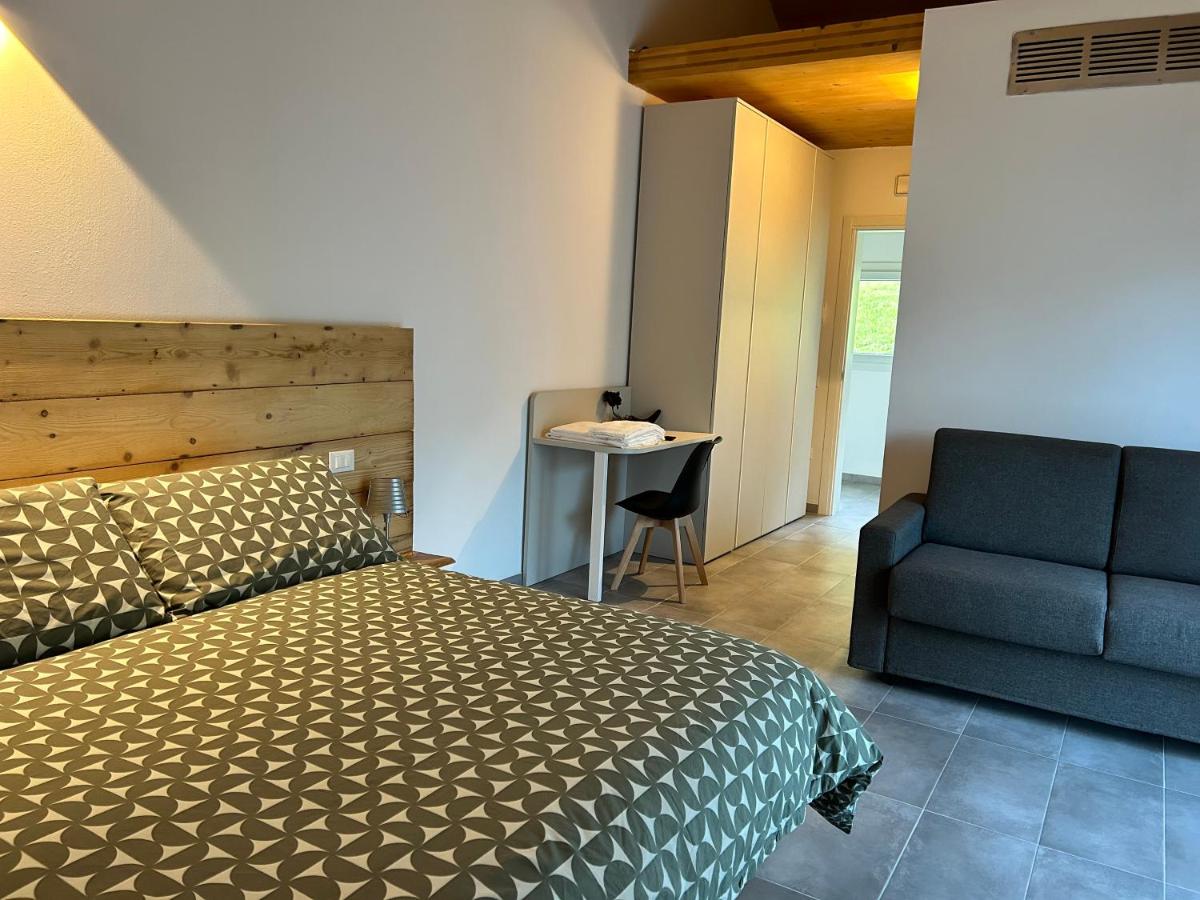 Camera Matrimoniale Deluxe (2 Adulti + 1 Bambino) 