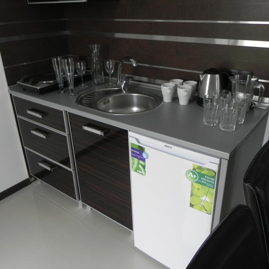 Deluxe Quadruple Room with Kitchenette