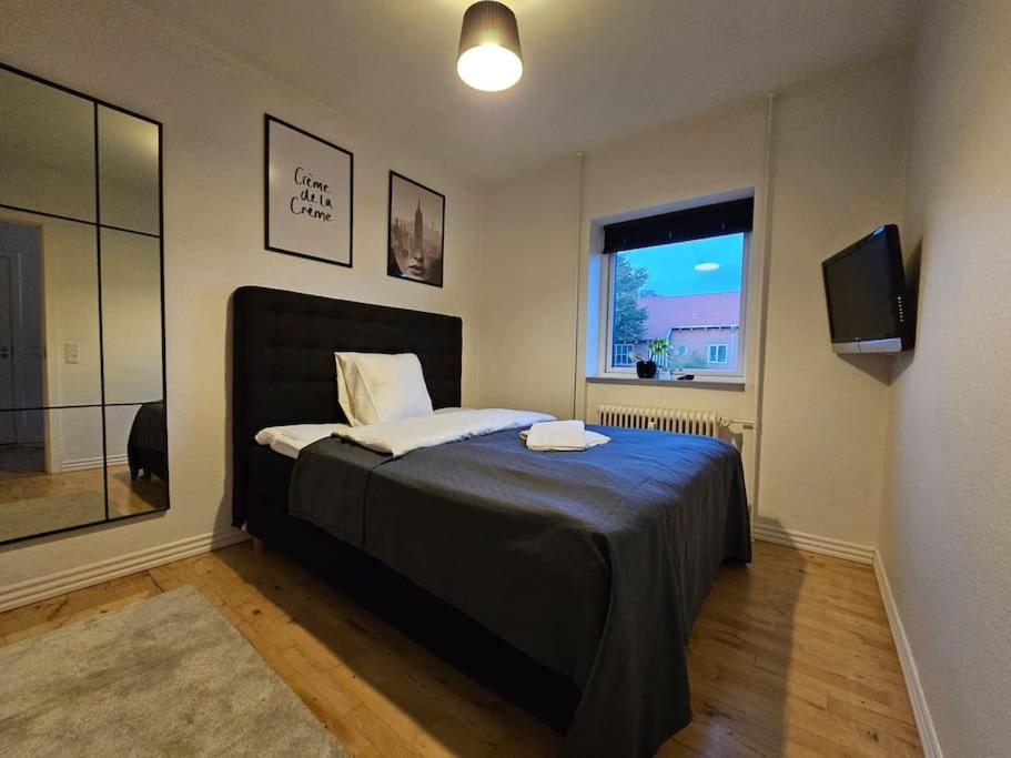 Lejlighed med altan og gratis parkering - Ferienwohnung