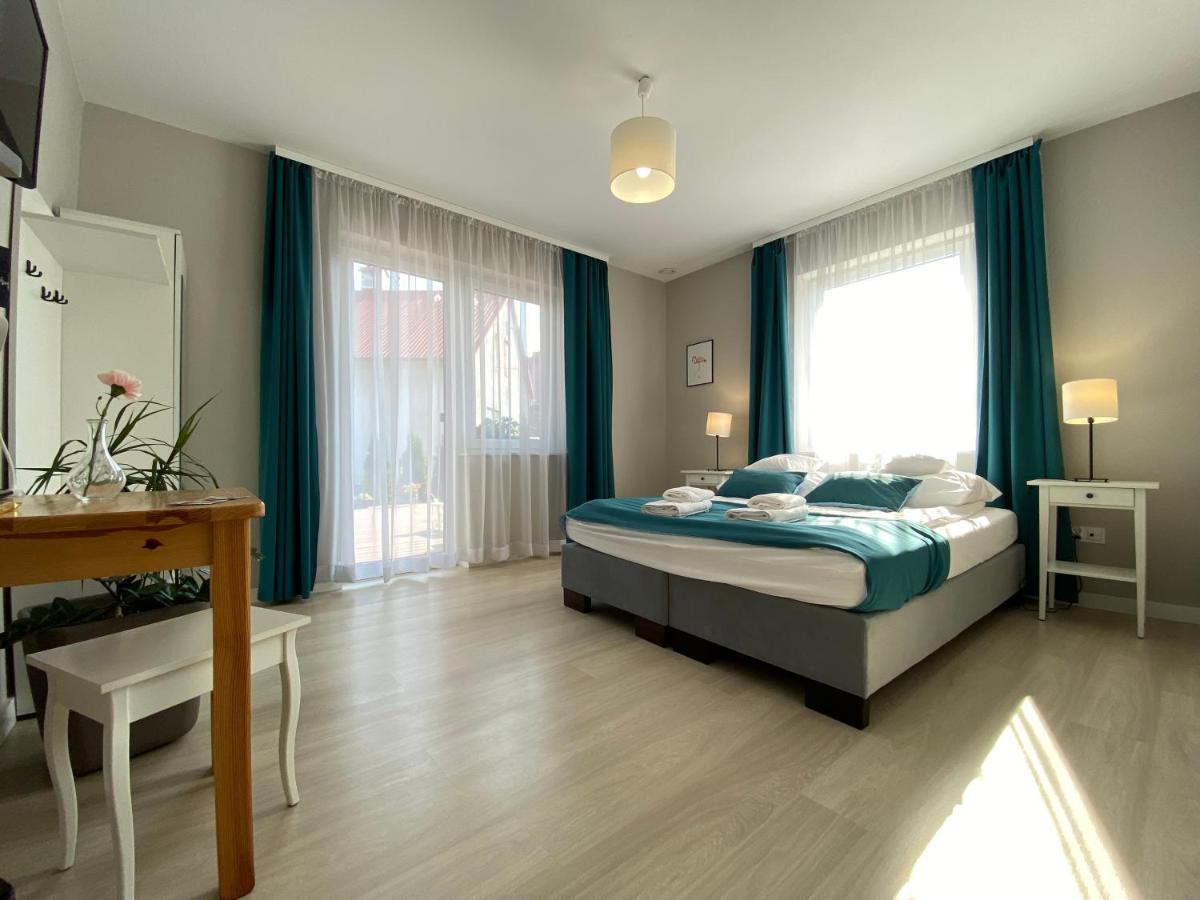 Tweepersoonskamer met 1 of 2 Bedden en Gedeelde Badkamer