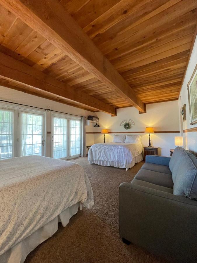 Deluxe Queen Room with Two Queen Beds and Private Bathroom