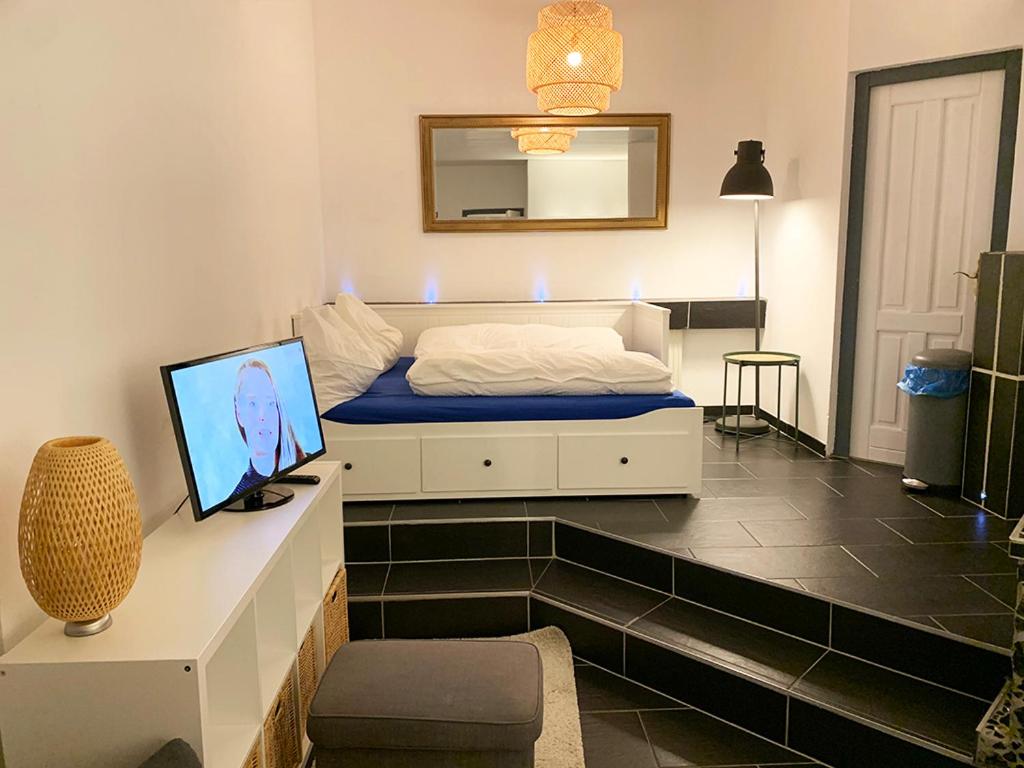 Apartment mit 1 Schlafzimmer und Dusche (über dem Musikclub)