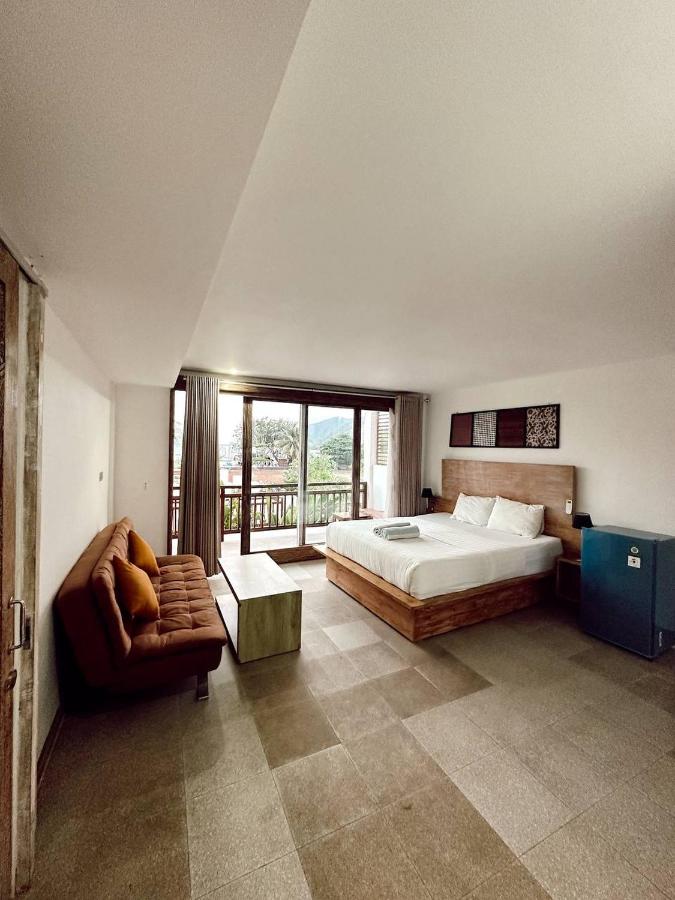 Chambre Double Deluxe - Vue Latérale sur Mer