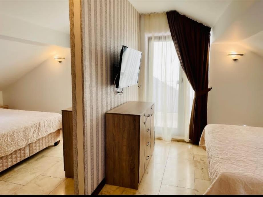 Tweepersoonskamer met 1 of 2 Bedden