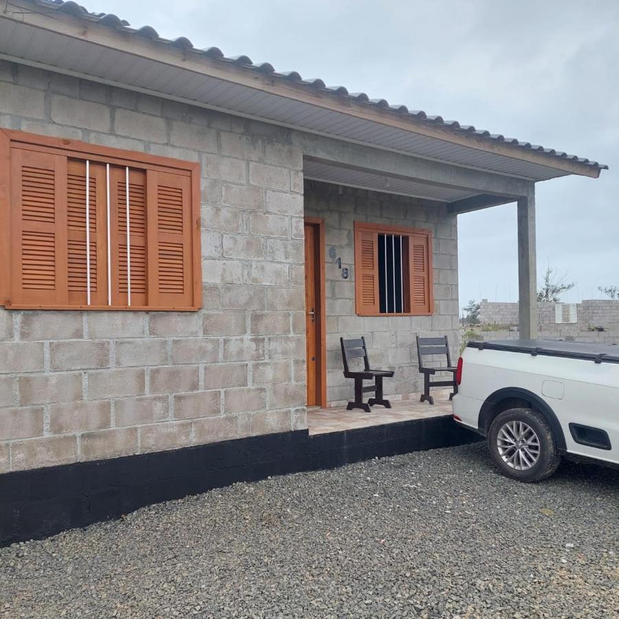 Casa para temporada em Arroio do Silva a 900m do mar - Chambres d’hôtes