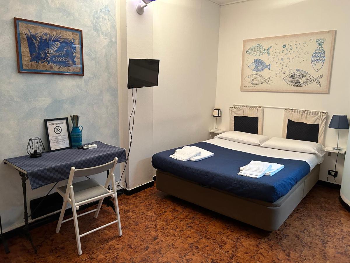 Dreibettzimmer mit Gartenblick