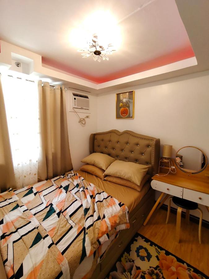 Rj condotel @arezzo place davao - B&B