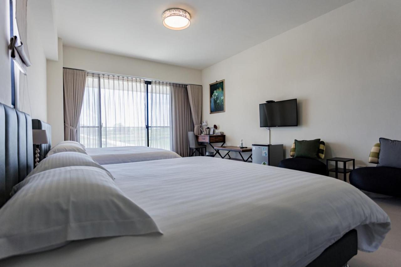 Camera Quadrupla con Vista Giardino 