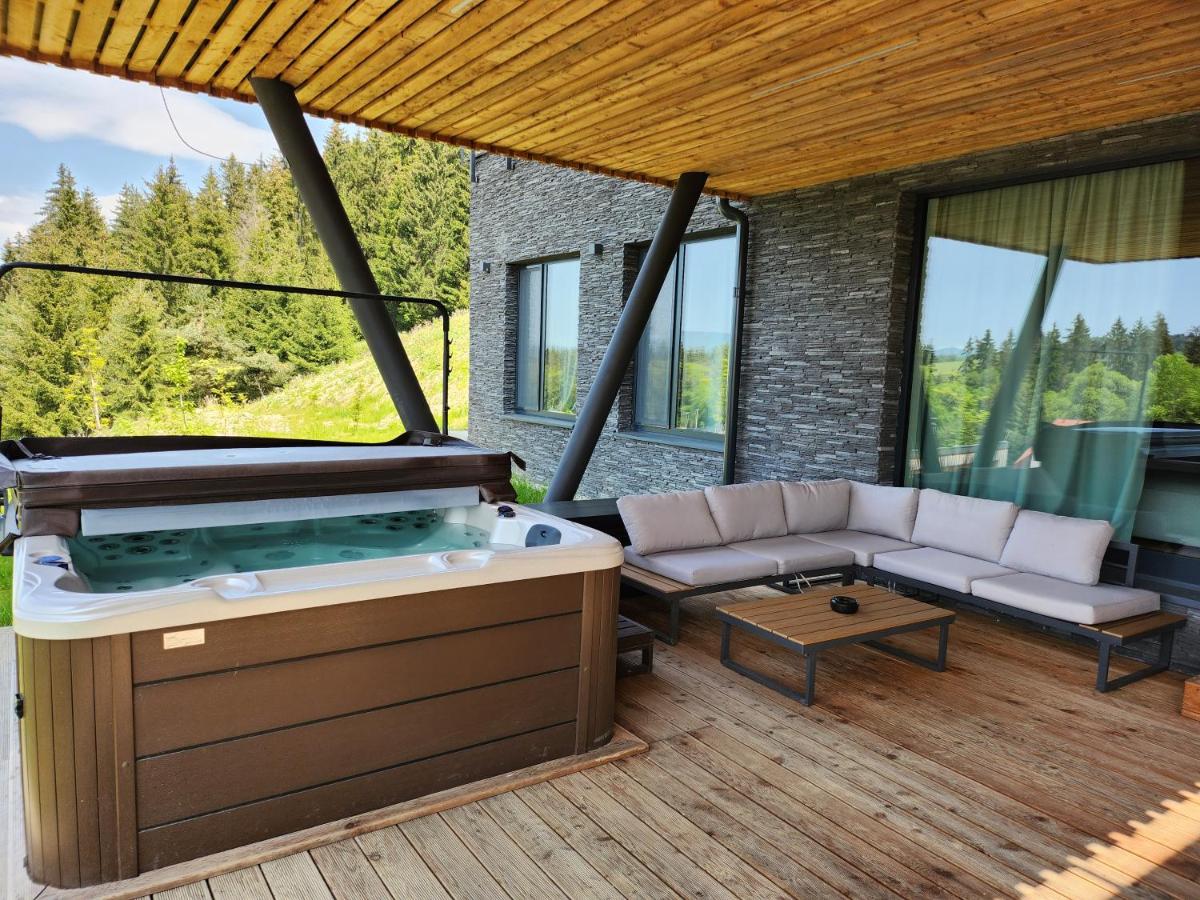 Four-Bedroom Chalet with Jacuzzi