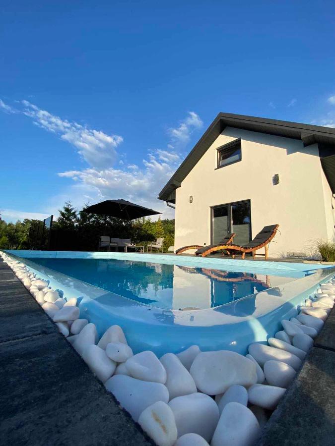 Domek Viking z prywatnym ogrzewanym basenem sauną oraz balią z jacuzzi