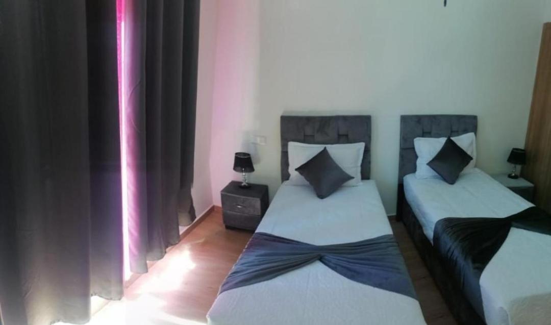 Un élégant appartement meublé à louer à Marrakech avec deux piscines et une vue magnifique - B&B