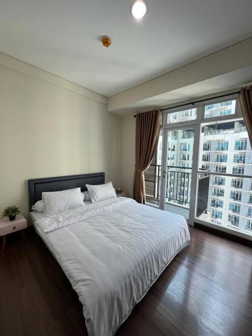 B&B Jakarta - Traveler's Retreat 1BR at Puri Orchard - Bed and Breakfast Jakarta