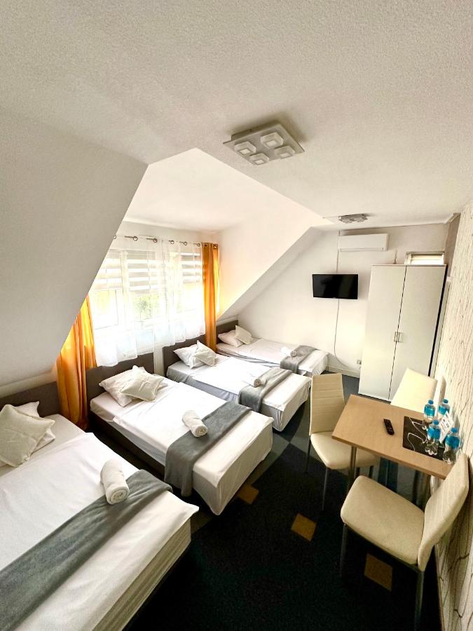Quadruple Room with Shared Bathroom