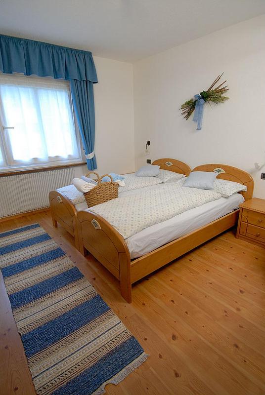 Camera Familiare con Bagno in Comune
