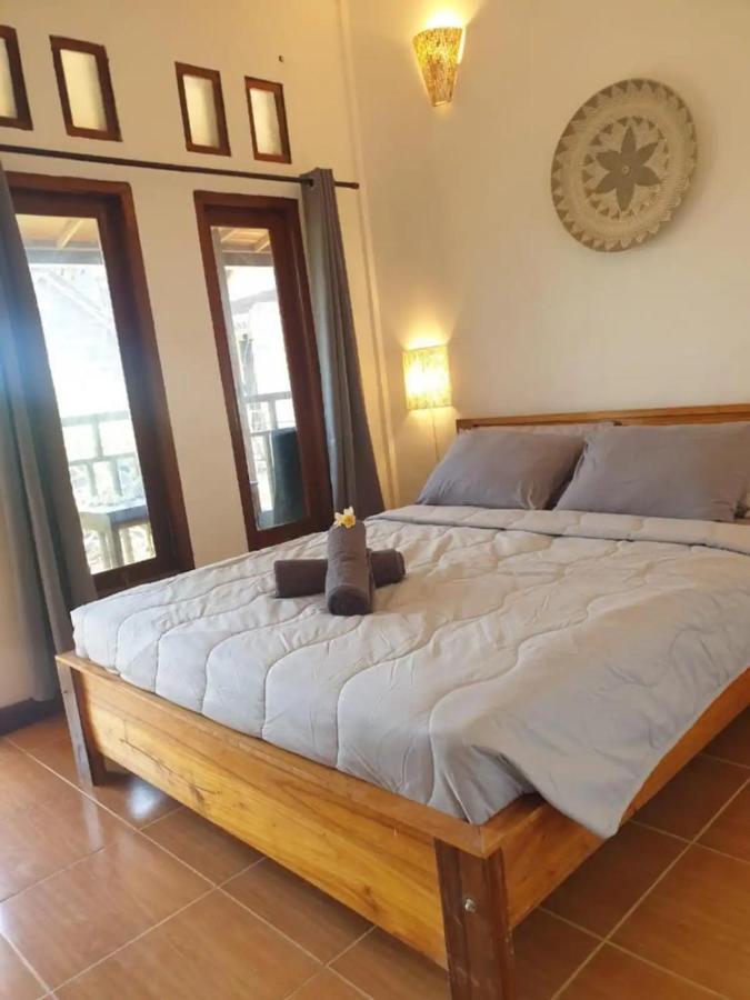 Tiga Dara Homestay - B&B