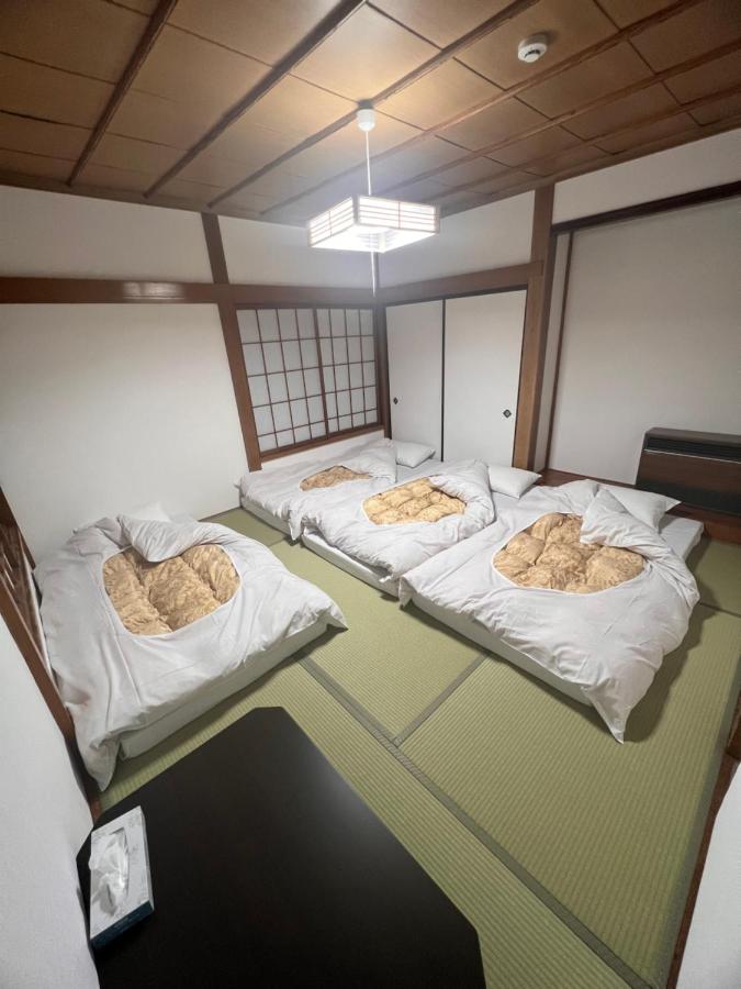 Quadruple Room with Shared Bathroom