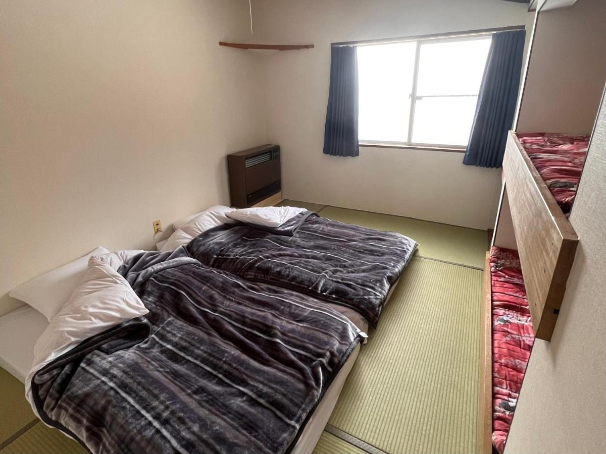 Economy Quadruple Room with Shared Bathroom