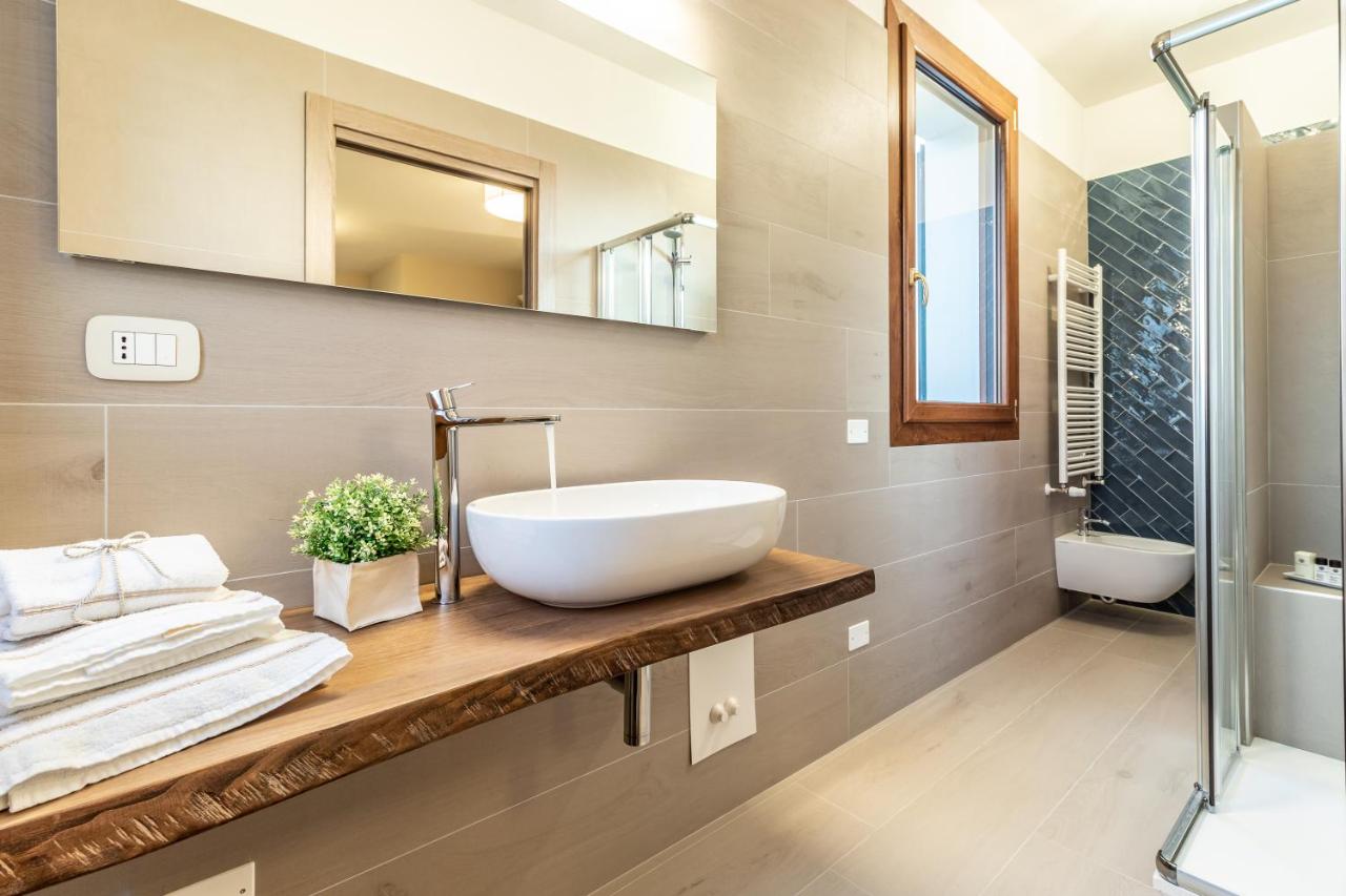 Camera Quadrupla con Doccia