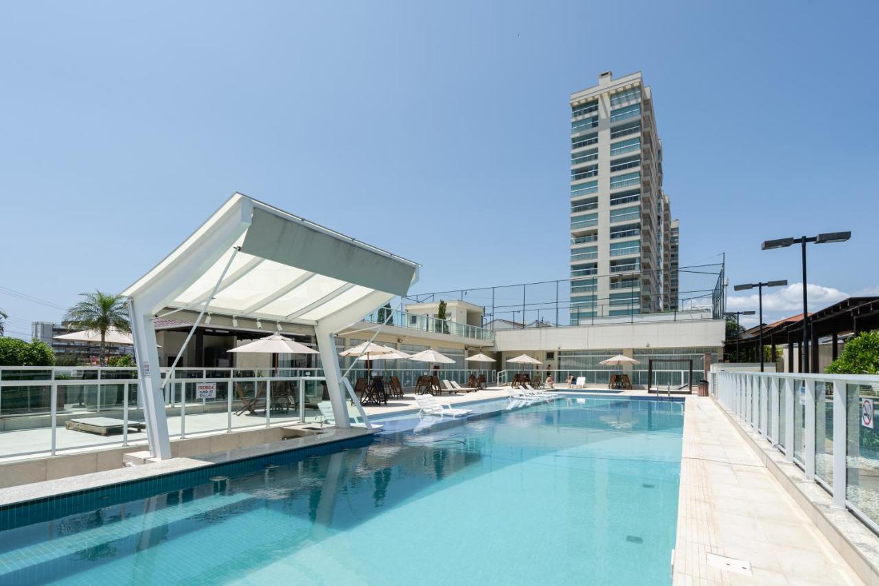 Apartamento 3 QUARTOS com VISTA MAR DESLUMBRANTE, ar-condicionado, Wi-Fi, cozinha completa, Condomínio Home Club com PISCINA, SAUNA, ACADEMIA, quadra de esportes playground infantil, salão de jogos e mini mercado a 40m da PRAIA e 1400m do Beto Carreiro - Bed and Breakfast Penha