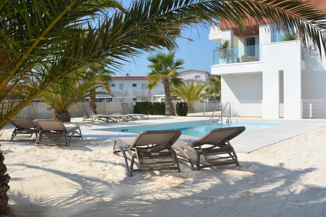 Sun Beach Residence con Piscina - Piazza Brescia - Adria Holiday Jesolo - FAMILY APARTMENTS - Ferienwohnung Lido di Jesolo