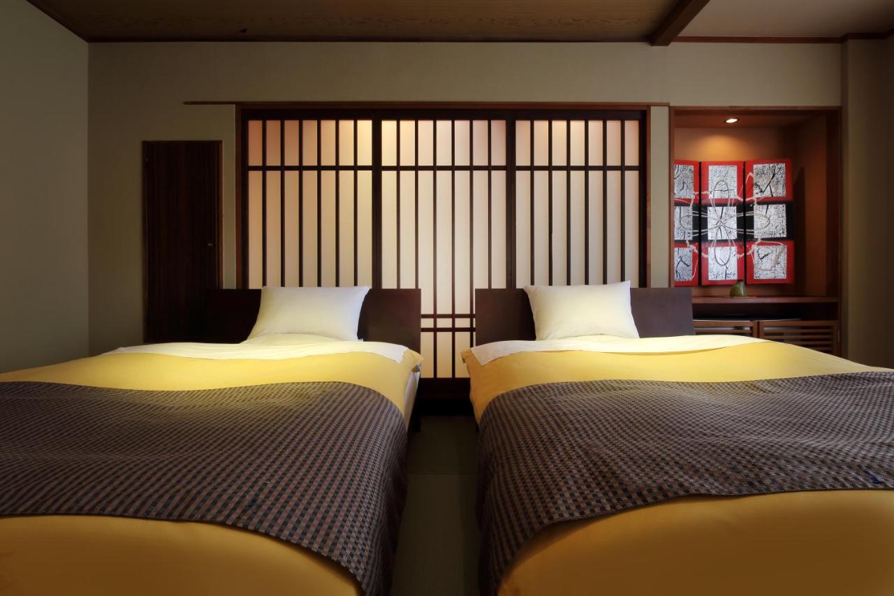 Habitación Doble con zona de tatami con vistas a las montañas - 2 camas