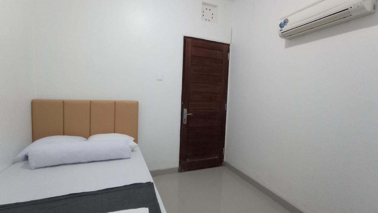 Habitación Individual con ducha y aseo compartidos