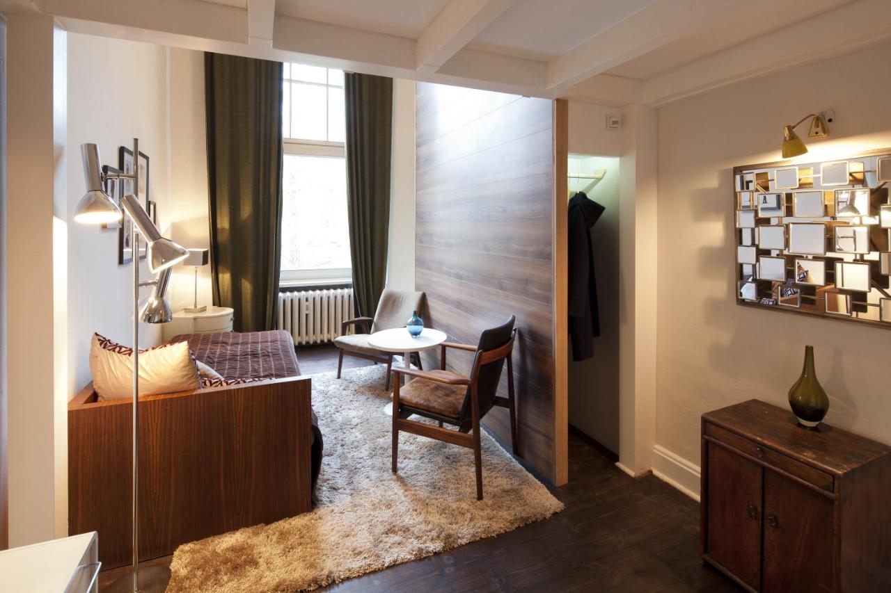 Triple Room (2 Adults + 1 Child) with Shared Bathroom