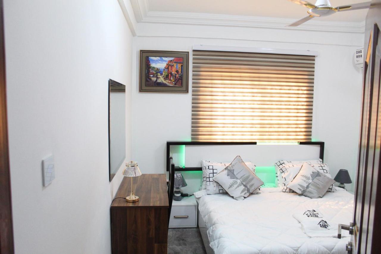 One-Bedroom Apartment with Balcony and City View