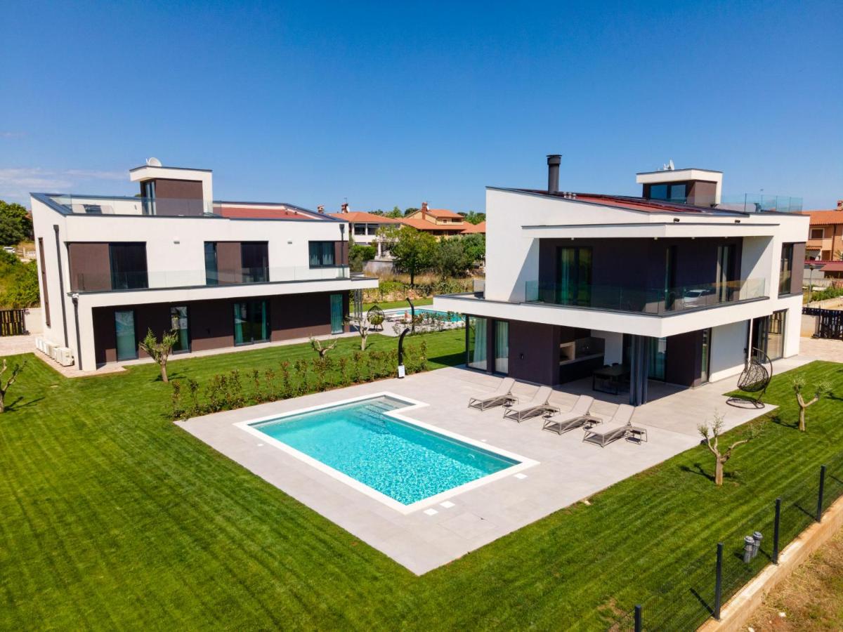 Villa Arestea near Pula with sea view, wellness & playground - Chambres d’hôtes