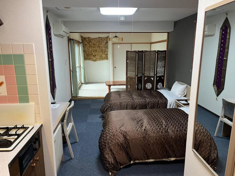 フューデイズコンドミニアム定山渓211号室(最大5名まで) - Chambres d’hôtes Jōzankei