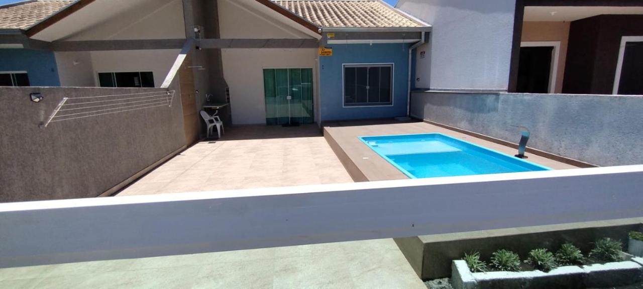 Casa com piscina em Pontal do Paraná - Balneário de Ipanema - Chambres d'hôtes Pontal do Paraná
