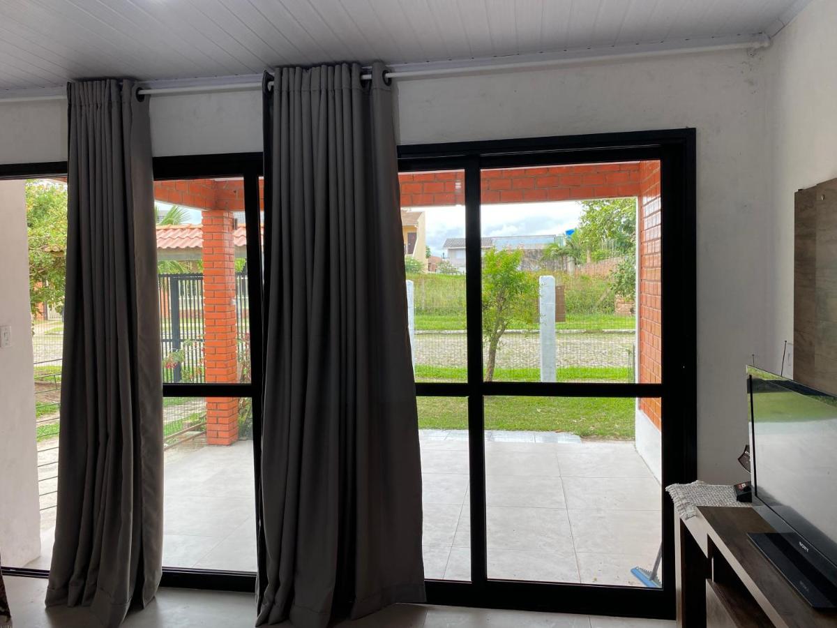 Casas de Veraneio em Torres com Terreno Compartilhado - Frontal - B&B