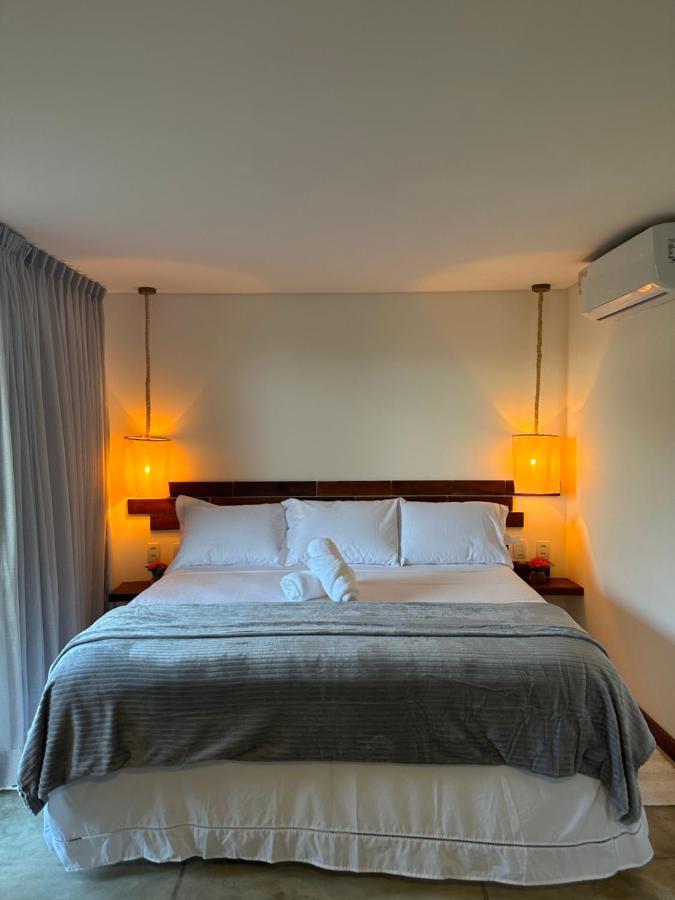 Suite con cama extragrande y vistas al mar