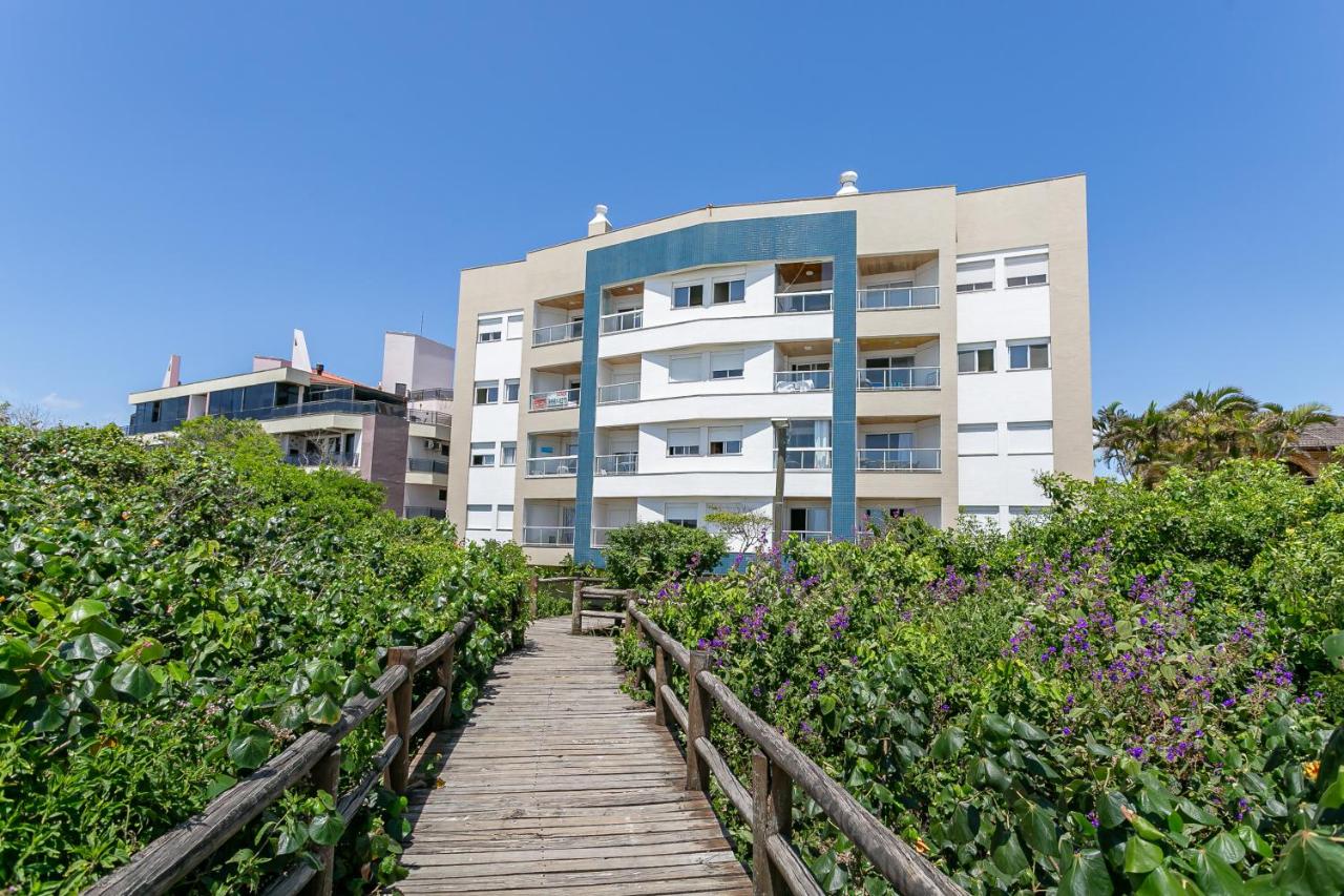 Prédio nos Ingleses pé-na-areia com piscina - Aquarelle - B&B