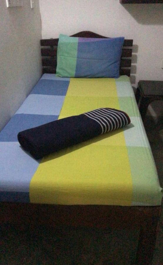 Single Bed in Dormitory Room