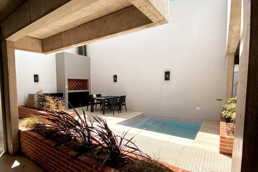 Departamento PREMIUM Con mini pileta y parrilla compartida En la mejor ubicación de Junín - B&B