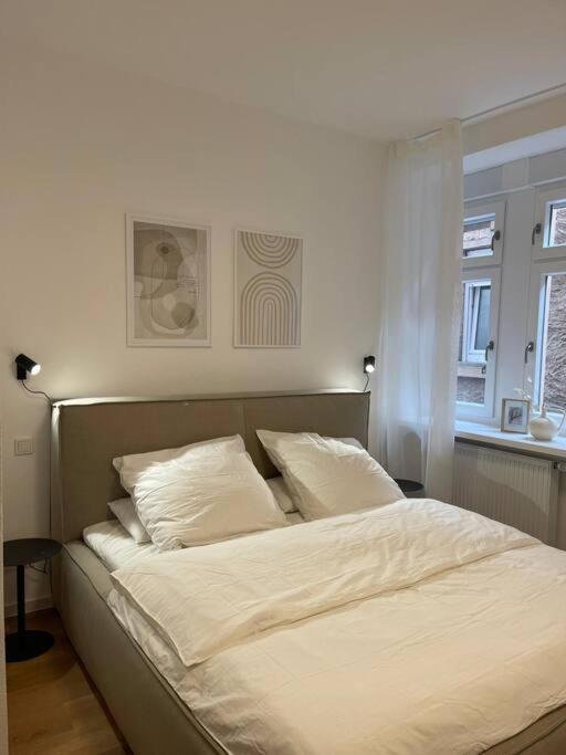 Stilvolle Mosel-Ferienwohnung - Alte Apotheke in Ürzig - Bis 5 Personen - 2 Schlafzimmer - großes Badezimmer - B&B